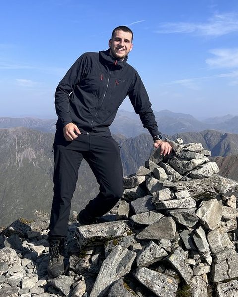 Jake, co-founder of MedPath Scotland, on a Scottish hilltop